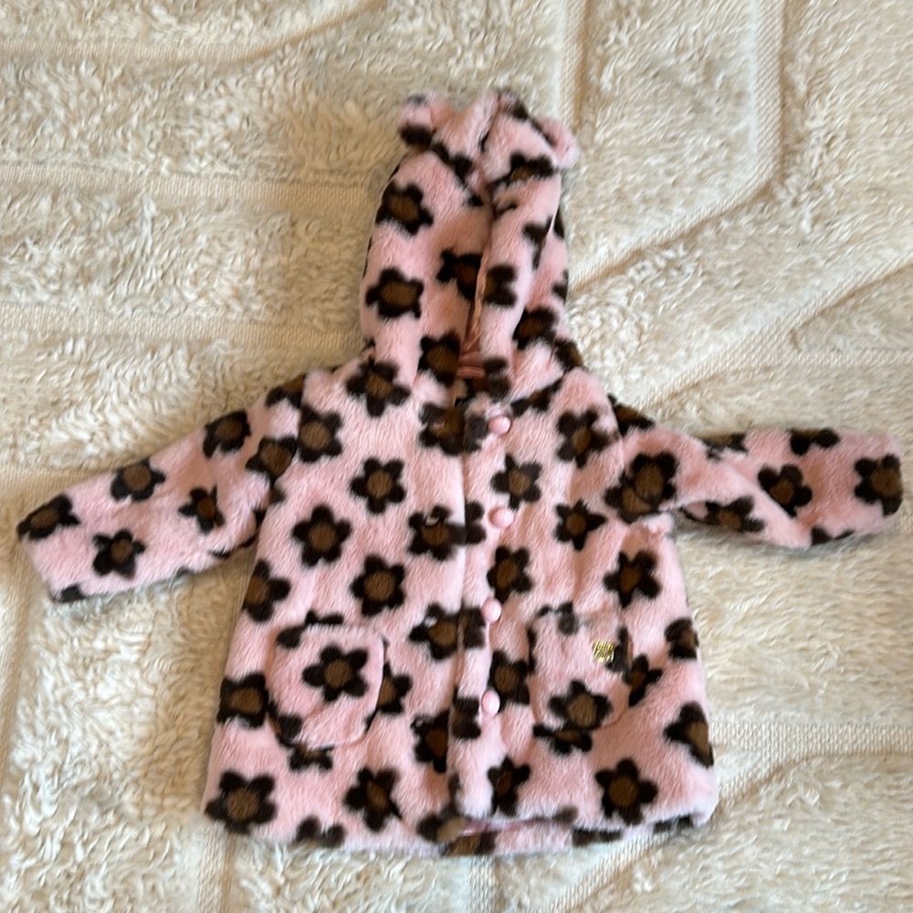 Cute pink jacket with ears. Bought from a small boutique in Naples FL.